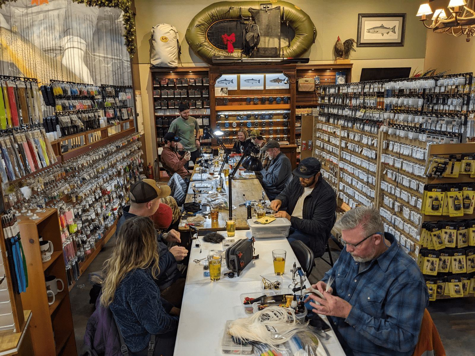 Community members tie flies at Confluence Fly Shop